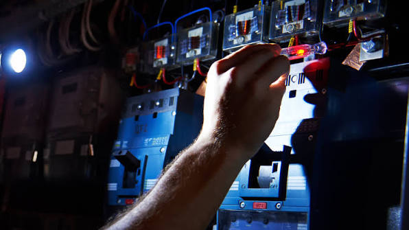 Electrician working on a switchboard